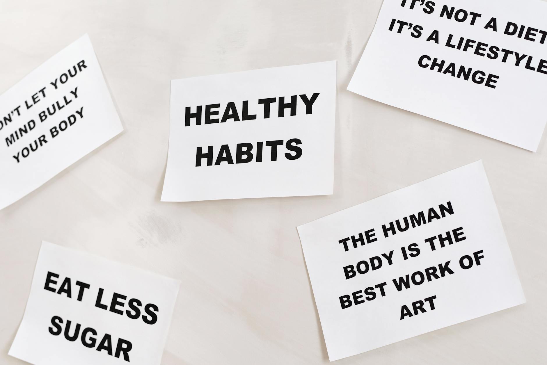 Motivational cards promoting healthy habits and positive thinking for lifestyle change.